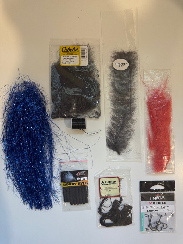 Best tarpon fly tying materials including synthetic flash, foam, brush, and hooks for DIY inshore fishing in Grand Cayman, Cayman Islands